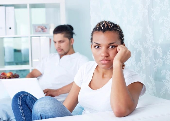 balck woman with busy black guy